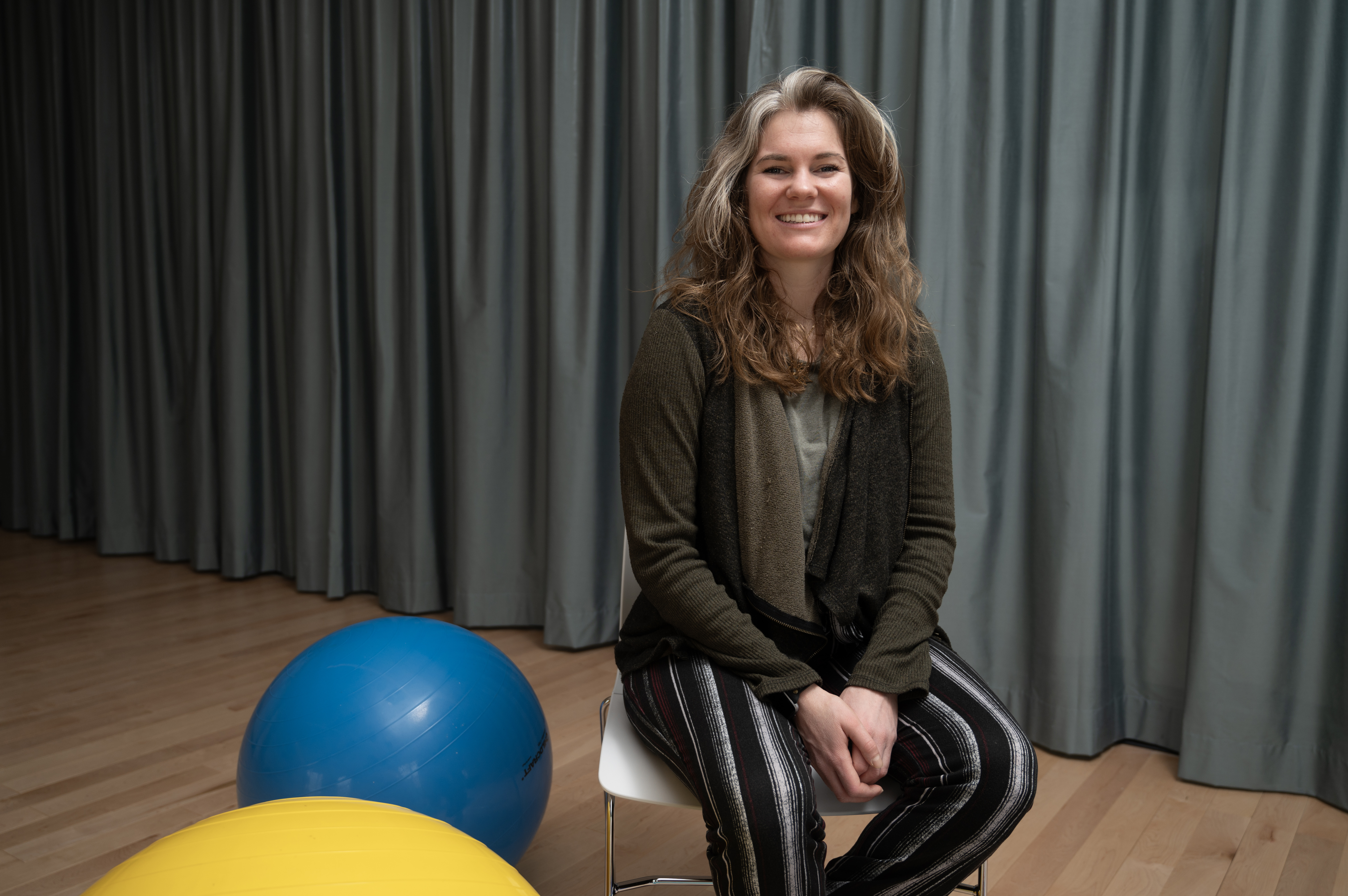 Genevieve Hargrove seated in studio